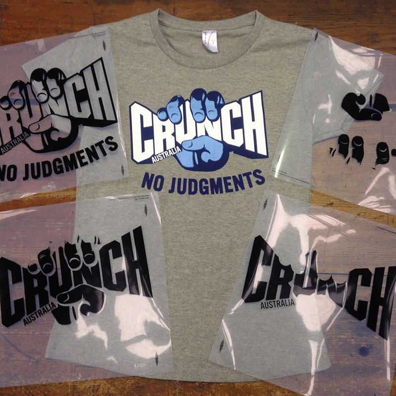 Photo of a screen printed Cruch Fitness t-shirt overlaid with the 4 film positives required to screen print it